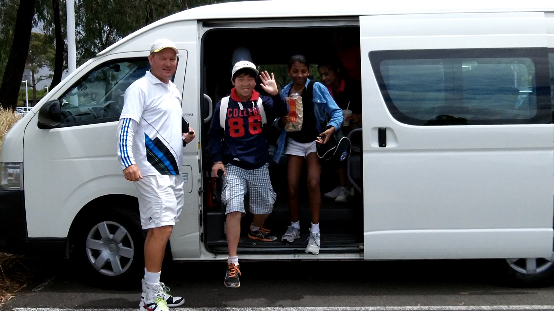 tennis travel coach